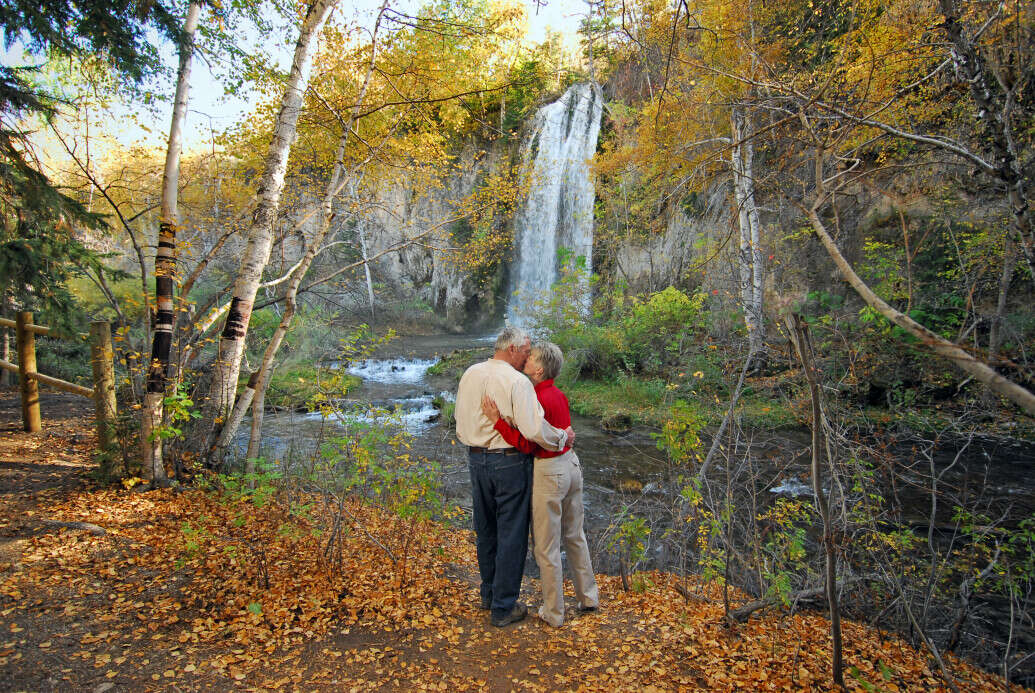 Couple enjoying Little Spearfish Falls